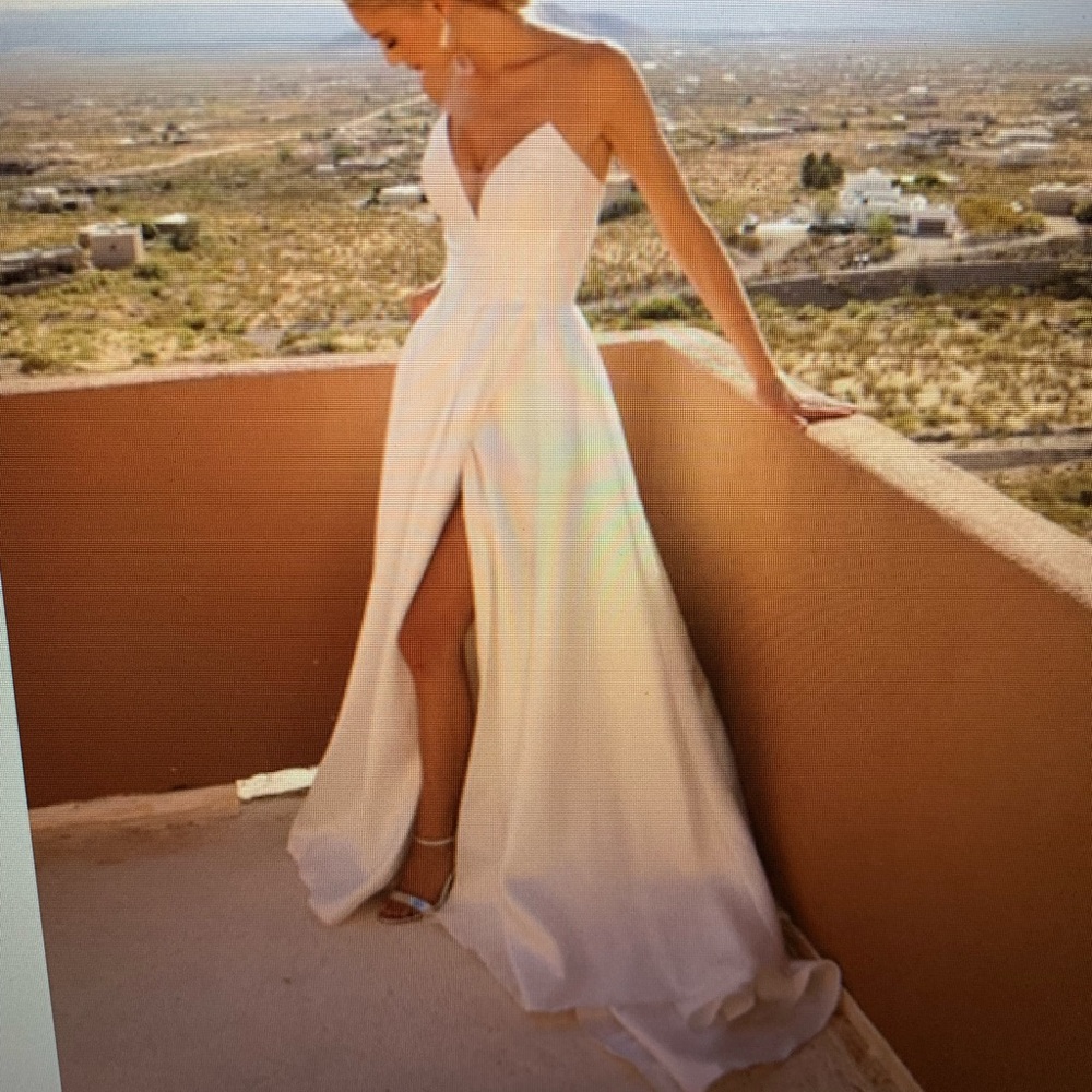 NEW Jimme Huang wedding dress purchased from Beckers Bridal in Fowler, MI